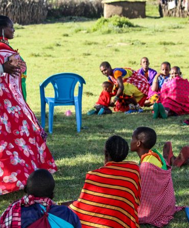GCF Executive Director and women during a training session.